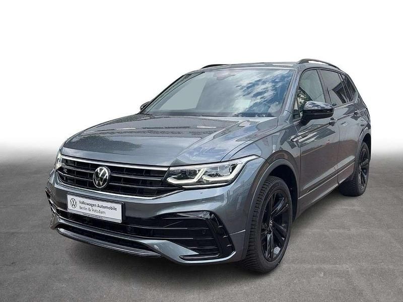 Platinum grey metallic Gebraucht 2023 VW Tiguan Allspace R-line SUV | 41.443 € (Etwas zu teuer) - Bild 1/4