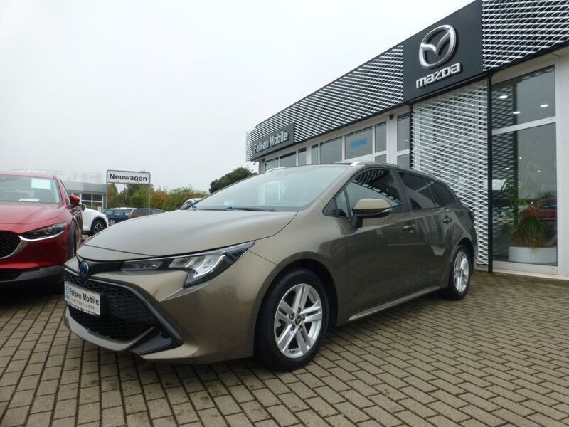 Braun Gebraucht 2022 Toyota Corolla Hybrid Comfort Kombi | 23.990 € (Fairer Preis) - Bild 1/4