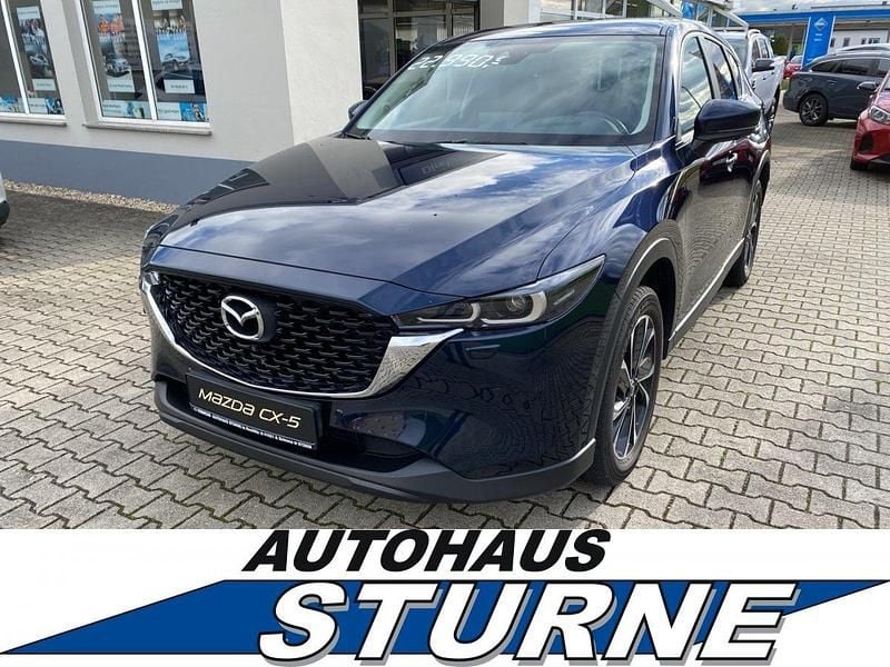 Deep crystal blue Gebraucht 2022 Mazda CX-5 Ad'Vantage SUV | 22.590 € (Fairer Preis) - Bild 1/4