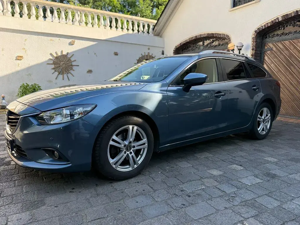 Używany Mazda 6 Center-Line 150 KM (110 kW) 2014 Niebieski Kombi