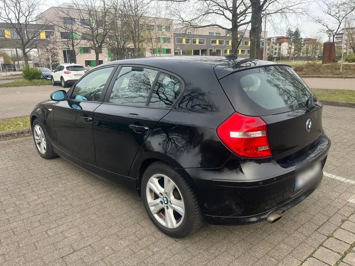 Second-hand BMW 116 122 CP (89 kW) 2007 Negru Hatchback