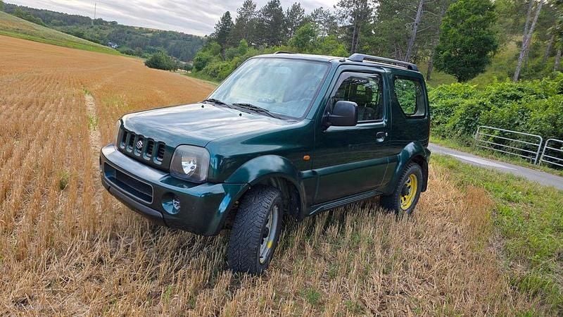 Grün Gebraucht 2004 Suzuki Jimny SUV | 4.700 € (Fairer Preis) - Bild 1/4