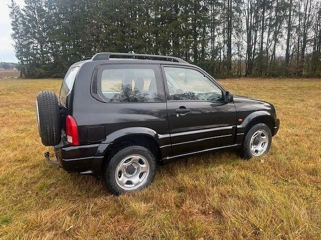 Schwarz Gebraucht 2005 Suzuki Grand Vitara Club SUV | 6.300 € (Etwas zu teuer) - Bild 1/4