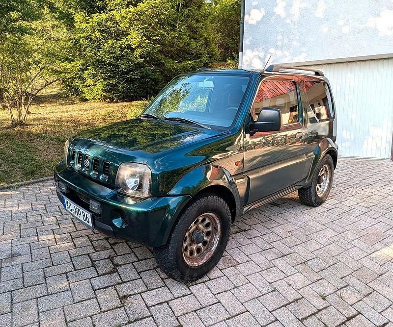 Grün Gebraucht 2002 Suzuki Jimny SUV | 3.600 € (Superpreis) - Bild 1/4