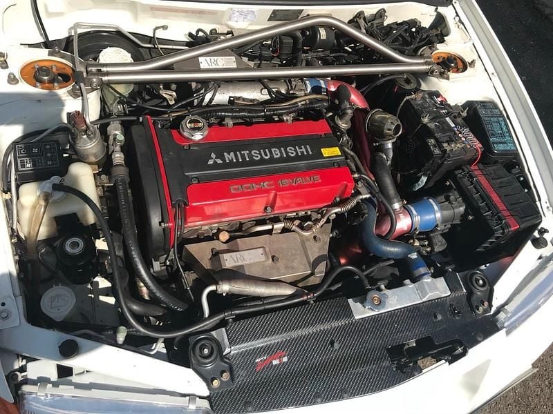 Second-hand Mitsubishi Lancer 280 CP (205 kW) 2000 Alb Berlinǎ