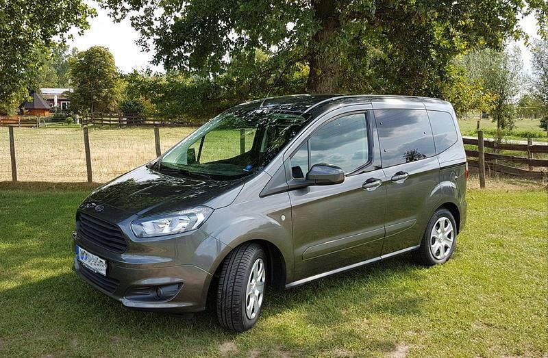 Gebraucht Ford Tourneo Courier Trend 101 PS (74 kW) 2018 Grau Van / Kleinbus