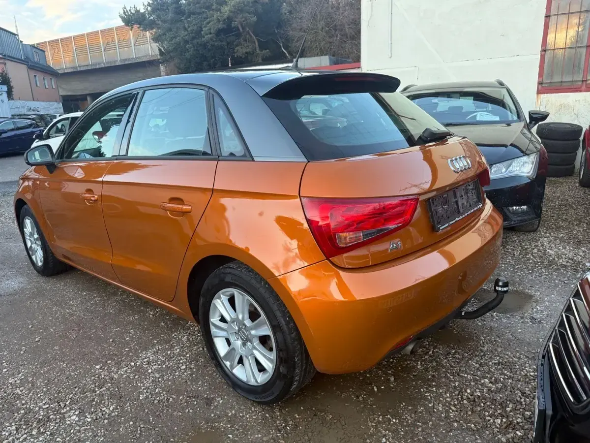 Gebraucht Audi A1 Sportback Attraction 90 PS (66 kW) 2014 Orange Kleinwagen