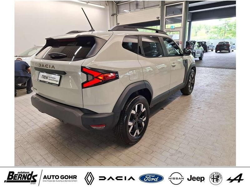 Gebraucht Dacia Duster 101 PS (74 kW) 2024 Sandstone metallic (hnv) SUV