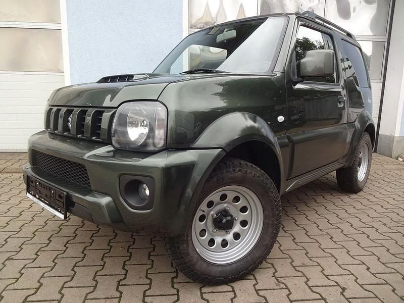 Grün Gebraucht 2017 Suzuki Jimny SUV | 15.990 € (Fairer Preis) - Bild 1/4
