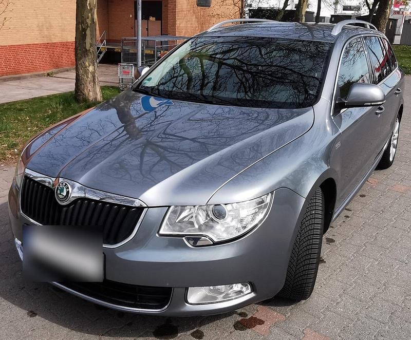 Używany Skoda Superb 125 KM (91 kW) 2012 Szary Kombi