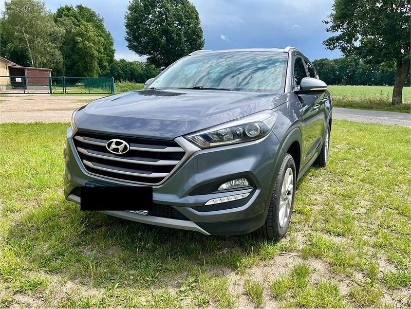 Grau Gebraucht 2017 Hyundai Tucson SUV | 13.999 € - Bild 1/4