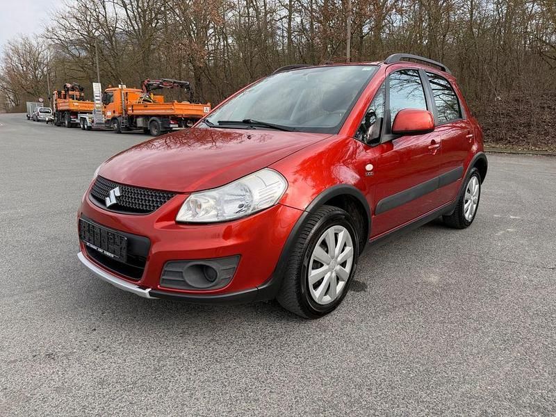 Gebraucht Suzuki SX4 Club 135 PS (99 kW) 2011 Orange SUV