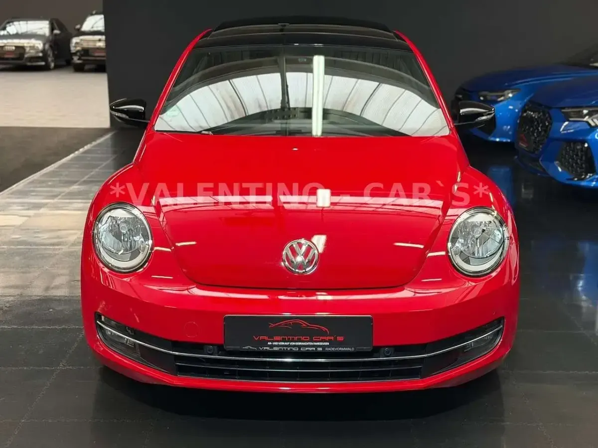 Używany VW Beetle 105 KM (77 kW) 2013 Czerwony Hatchback