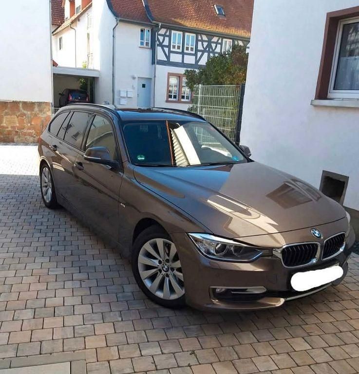 Braun Gebraucht 2013 BMW 320 Sport Line Kombi | 8.800 € (Fairer Preis) - Bild 1/4