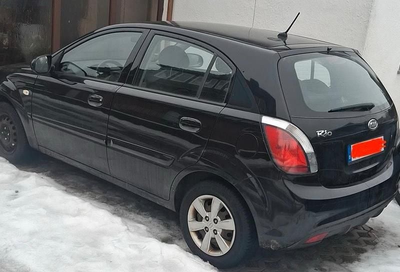 Gebraucht Kia Rio 96 PS (70 kW) 2010 Schwarz Kleinwagen