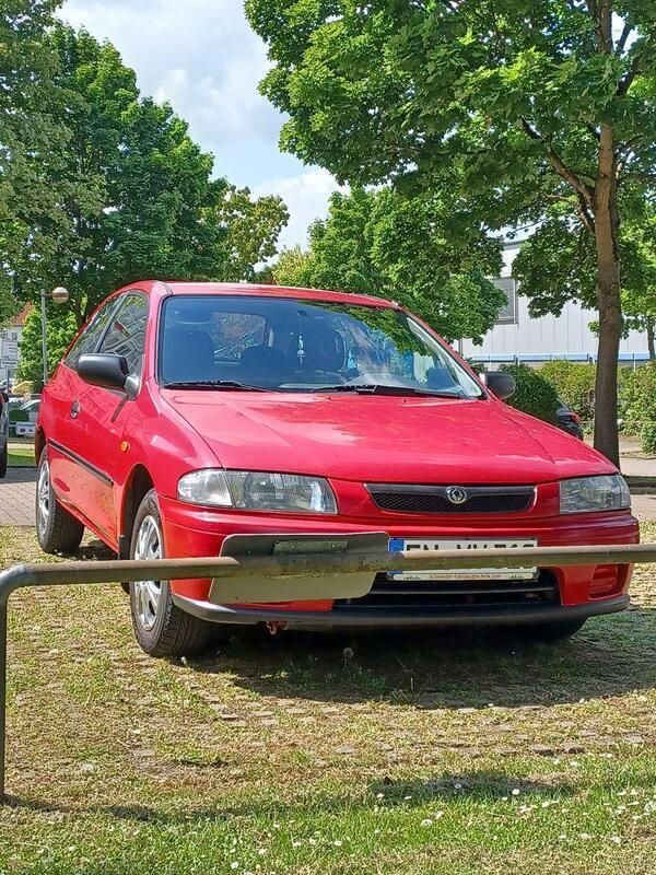 Rot Gebraucht 1997 Mazda 323C Limousine | 1.300 € - Bild 1/4