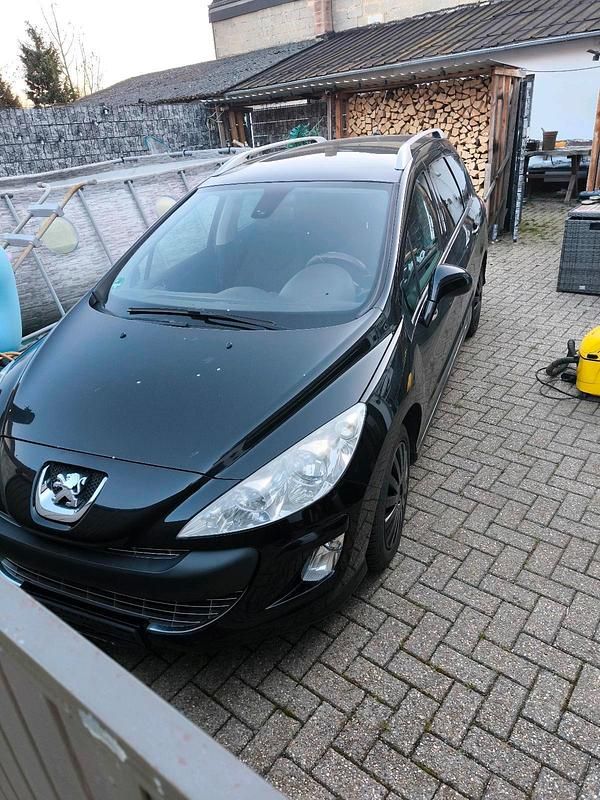 Gebraucht Peugeot 308 SW 109 PS (80 kW) 2010 Schwarz Kombi