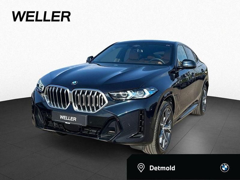 Carbonschwarz metallic (schwarz) Gebraucht 2025 BMW X6 M Sport SUV | 77.777 € (Superpreis) - Bild 1/4