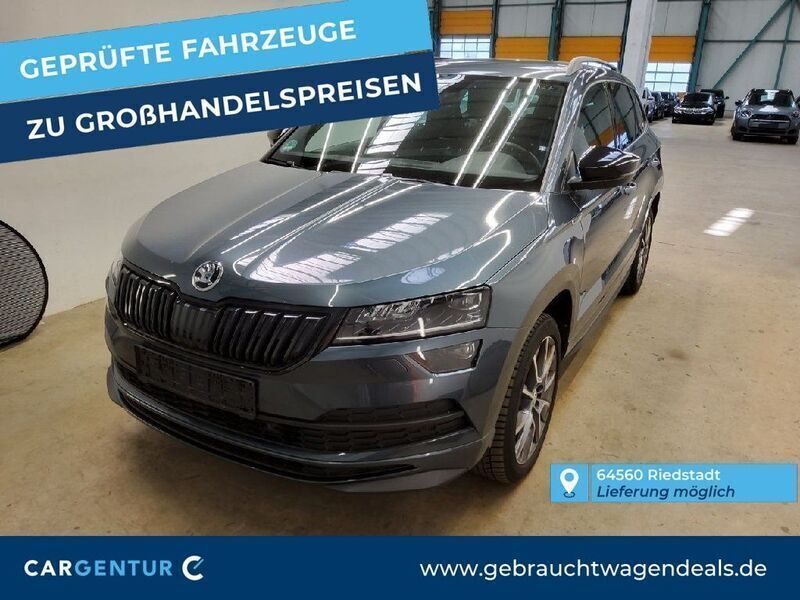 Quarz grau Gebraucht 2022 Skoda Karoq SportLine SUV | 23.790 € (Fairer Preis) - Bild 1/2