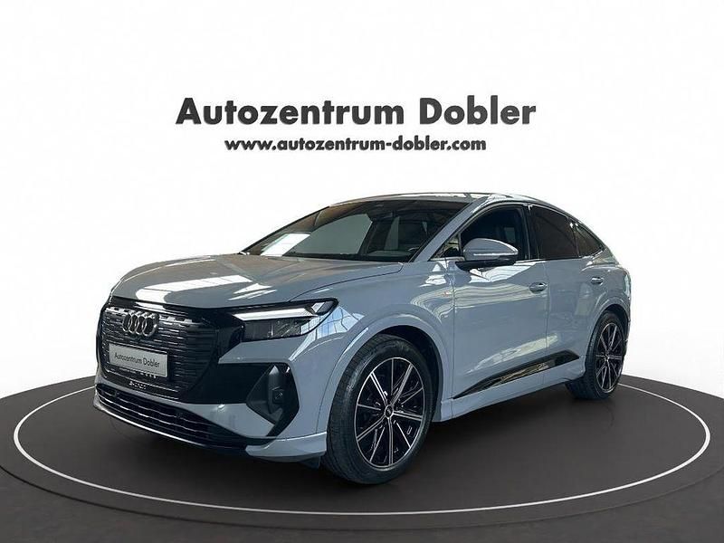 Grau Gebraucht 2022 Audi Q4 Sportback e-tron S-Line SUV | 28.444 € (Guter Preis) - Bild 1/4