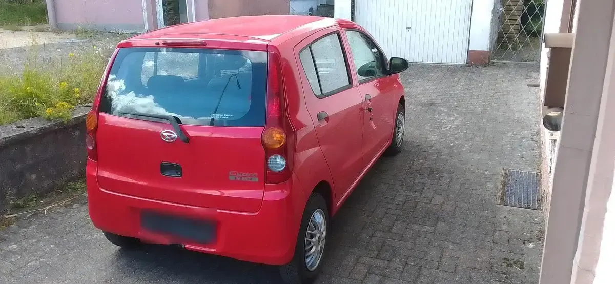 Gebraucht Daihatsu Cuore 69 PS (50 kW) 2007 Rot Kleinwagen