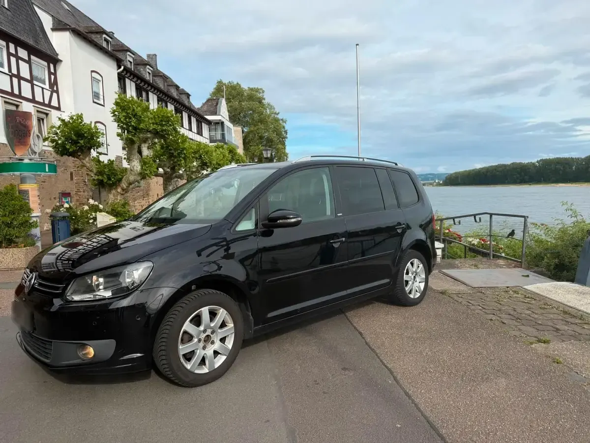 Gebraucht VW Touran 105 PS (77 kW) 2012 Schwarz Van / Kleinbus