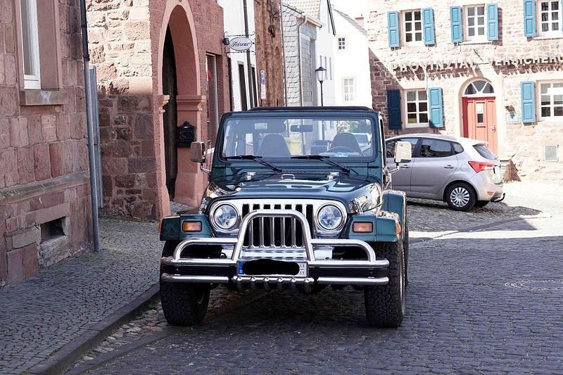 Grün Gebraucht 1999 Jeep Wrangler Sport SUV | 18.950 € (Guter Preis) - Bild 1/1