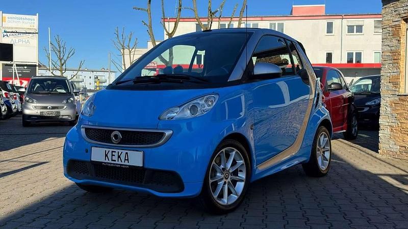 Porsche rivierablau & river si Gebraucht 2013 Smart ForTwo Cabrio Cabrio | 11.490 € - Bild 1/4