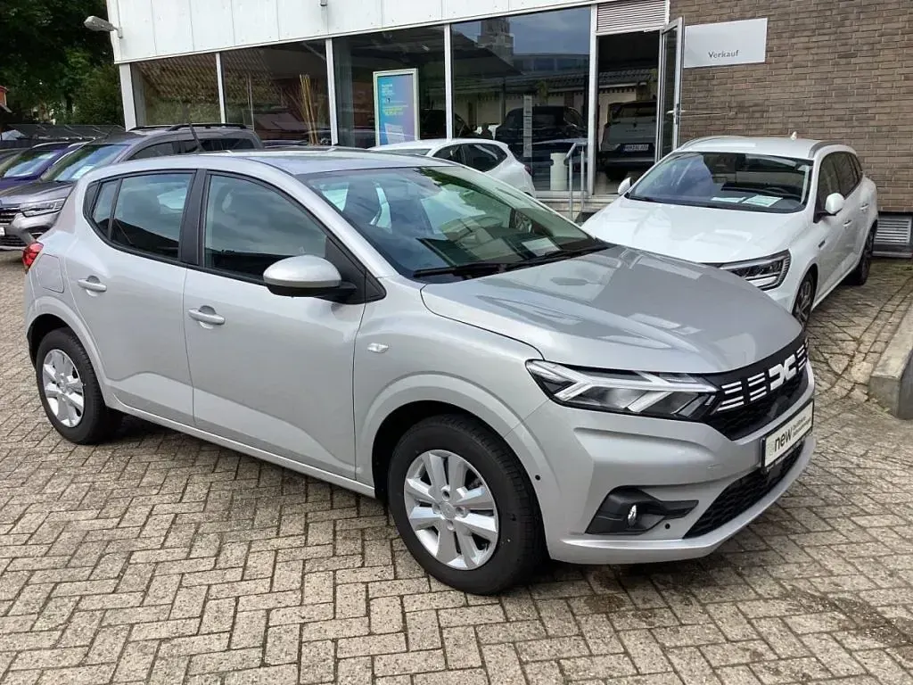 Gebraucht Dacia Sandero Expression 91 PS (66 kW) 2023 Moonstonegrau Kleinwagen