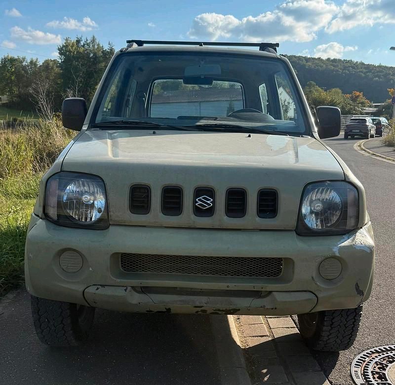 Grün Gebraucht 2002 Suzuki Jimny SUV | 2.900 € (Superpreis) - Bild 1/4