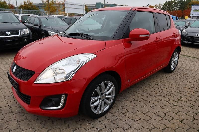 Rot Gebraucht 2016 Suzuki Swift Comfort Limousine | 5.990 € - Bild 1/4
