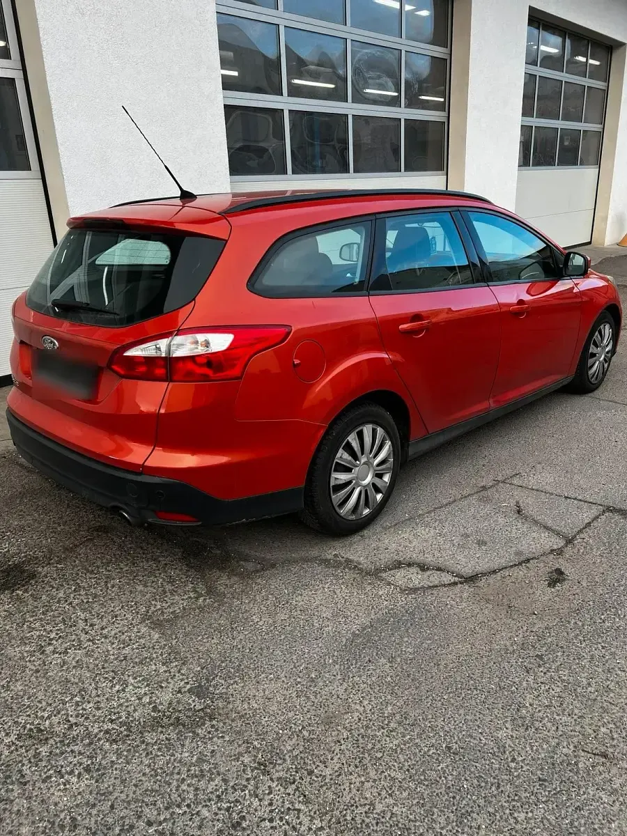 Gebraucht Ford Focus 115 PS (84 kW) 2011 Orange Kombi