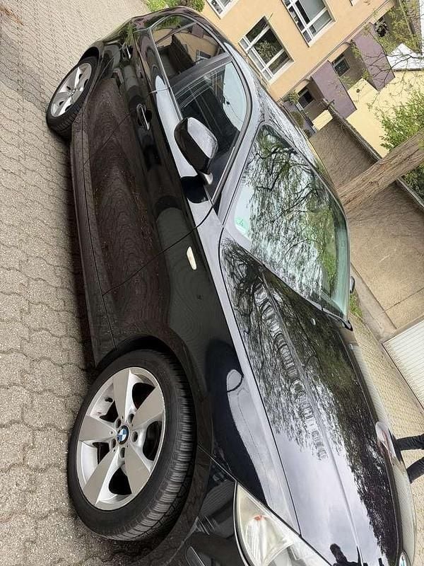 Second-hand BMW 116 122 CP (89 kW) 2011 Negru Hatchback