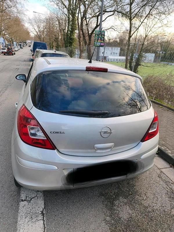 Second-hand Opel Corsa 90 CP (66 kW) 2010 Argintiu Hatchback