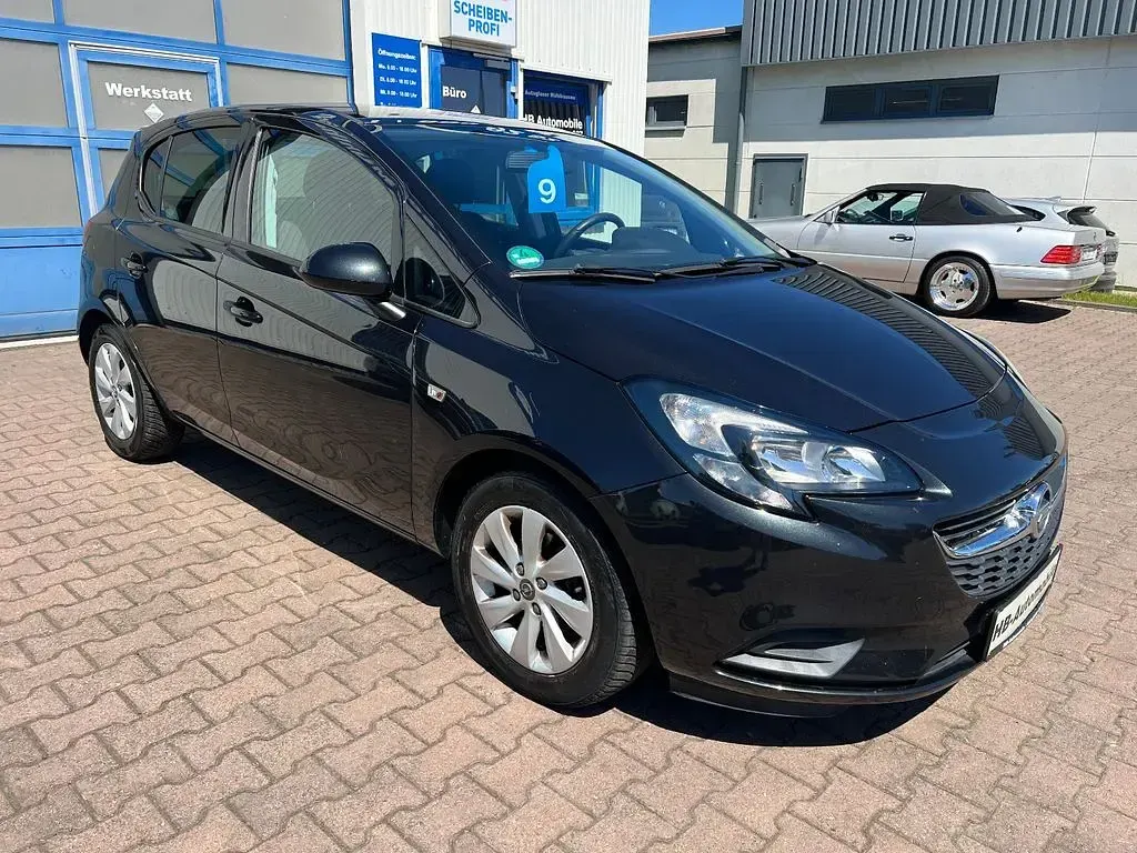 Używany Opel Corsa Edition 90 KM (66 kW) 2015 Czarny Hatchback