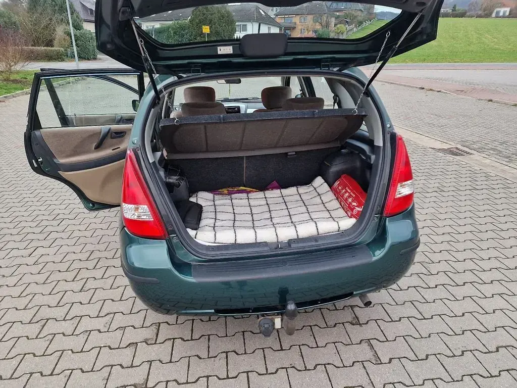Gebraucht Suzuki Liana 103 PS (75 kW) 2001 Grün Limousine