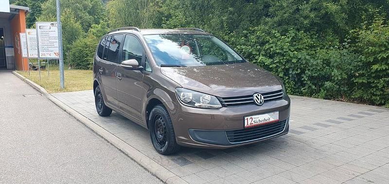 Braun Gebraucht 2012 VW Touran Comfortline Van / Kleinbus | 8.990 € (Fairer Preis) - Bild 1/4