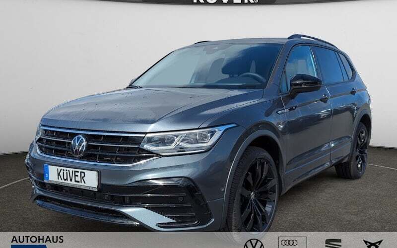 Grau Gebraucht 2024 VW Tiguan Allspace R-line SUV | 43.450 € (Fairer Preis) - Bild 1/4