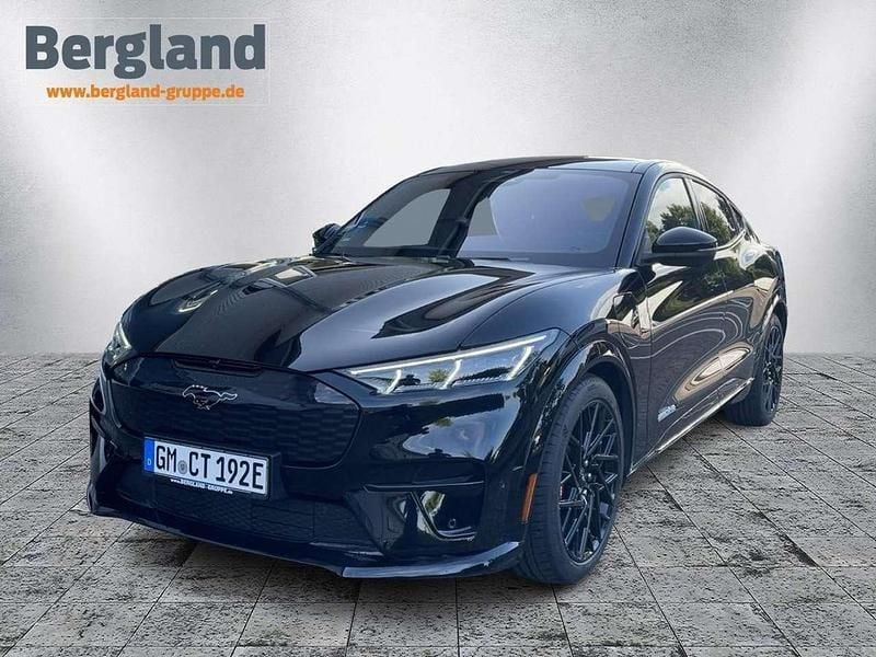 Lackierung metallic "absolute black" schwarz Gebraucht 2024 Ford Mustang Mach-E GT SUV | 52.990 € (Fairer Preis) - Bild 1/4