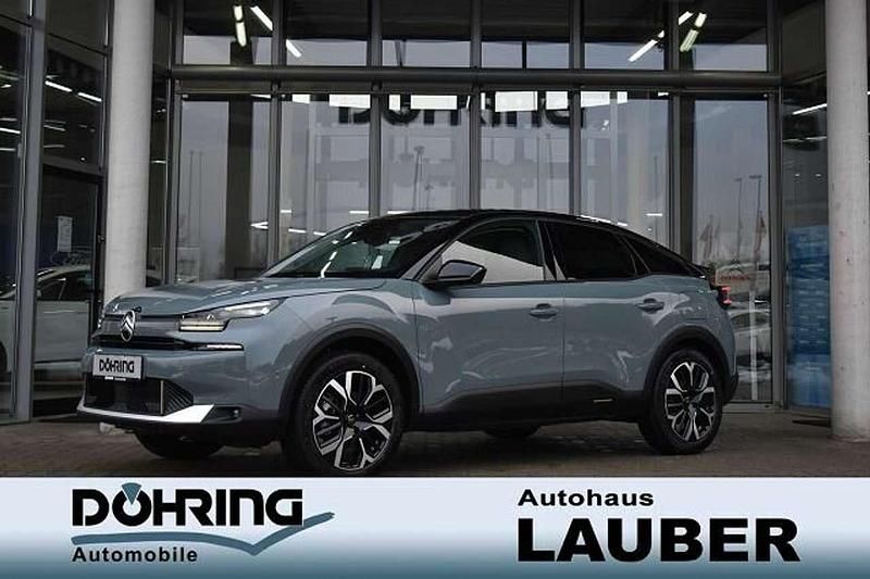 Manhattangrün Gebraucht 2025 Citroën e-C4 Limousine | 29.850 € - Bild 1/4