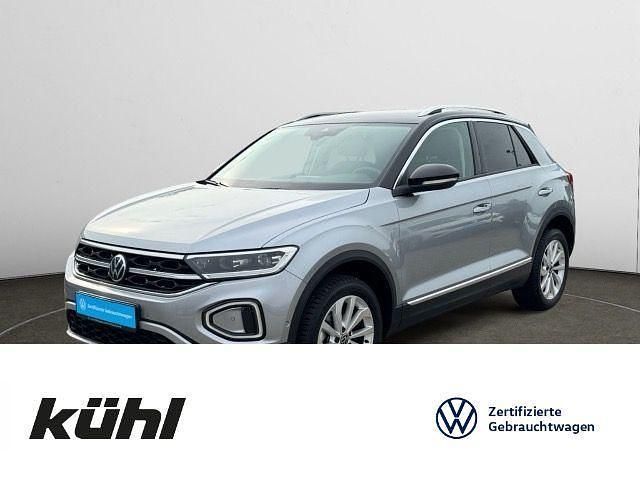 Pyritsilber metallic Gebraucht 2024 VW T-Roc Style SUV | 28.990 € (Fairer Preis) - Bild 1/4