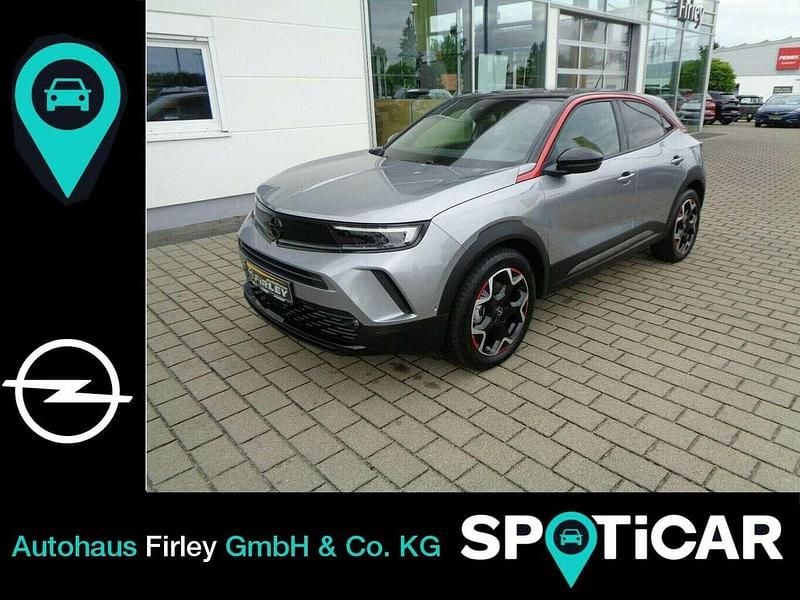 Quarz silber Gebraucht 2023 Opel Mokka-e GS Line SUV | 20.900 € (Fairer Preis) - Bild 1/4