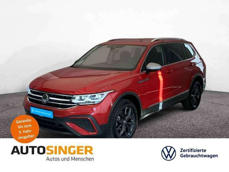 Kings red metallic Gebraucht 2024 VW Tiguan Allspace Move SUV | 40.850 € (Superpreis) - Bild 1/3