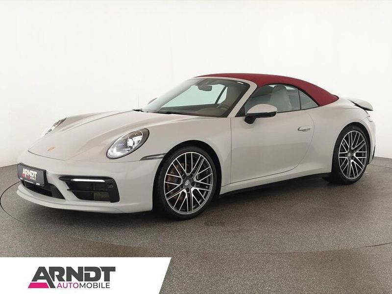 Grau Gebraucht 2023 Porsche 911 Carrera Cabrio | 122.884 € - Bild 1/4