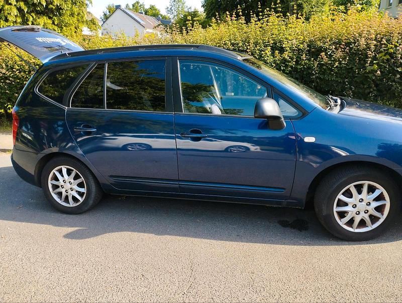 Blau Gebraucht 2009 Kia Carens Van / Kleinbus | 1.999 € (Superpreis) - Bild 1/4