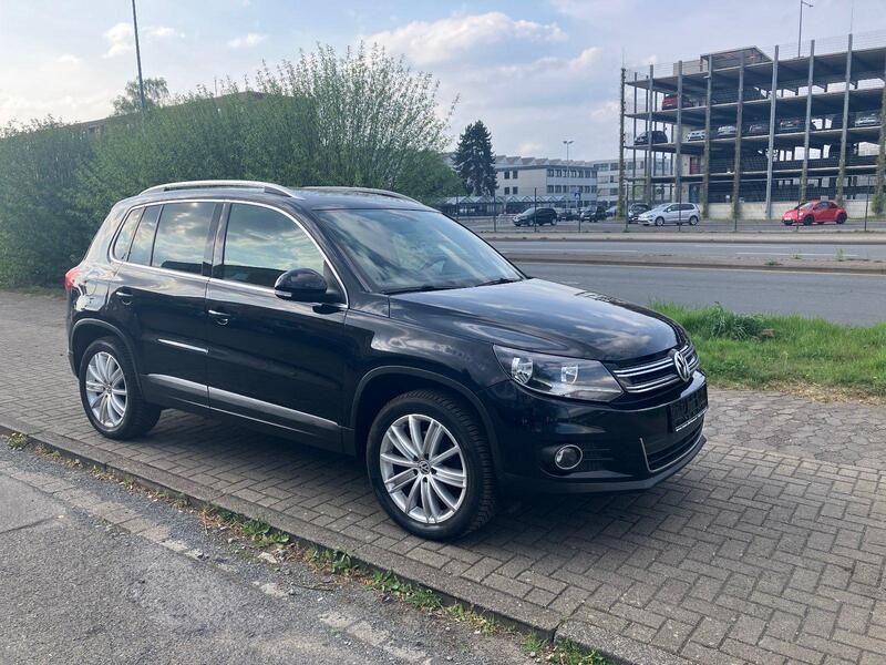 Deep black perleffekt Gebraucht 2012 VW Tiguan Sportline SUV | 11.400 € (Fairer Preis) - Bild 1/4