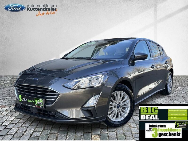 Magneticgrau (metallic) Gebraucht 2021 Ford Focus Titanium Limousine | 19.380 € (Superpreis) - Bild 1/4