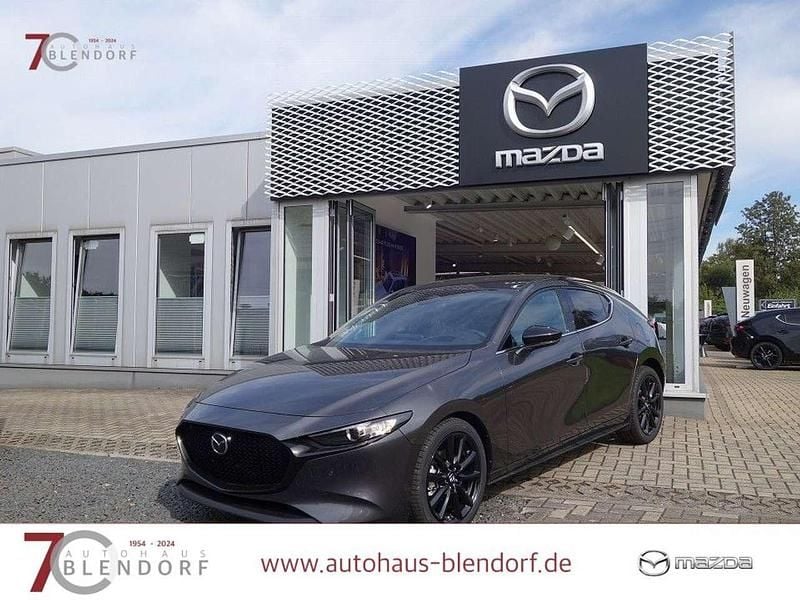 Machine gray Neu 2025 Mazda 3 Homura-Line Limousine | 26.640 € (Guter Preis) - Bild 1/3
