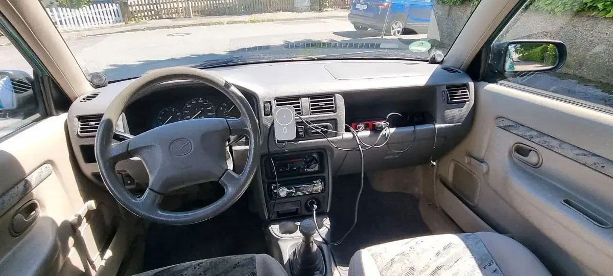 Używany Mazda Demio 63 KM (46 kW) 1998 Zielony Hatchback