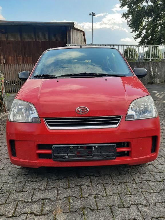 Rot Gebraucht 2004 Daihatsu Cuore Plus Kleinwagen | 2.650 € (Fairer Preis) - Bild 1/4